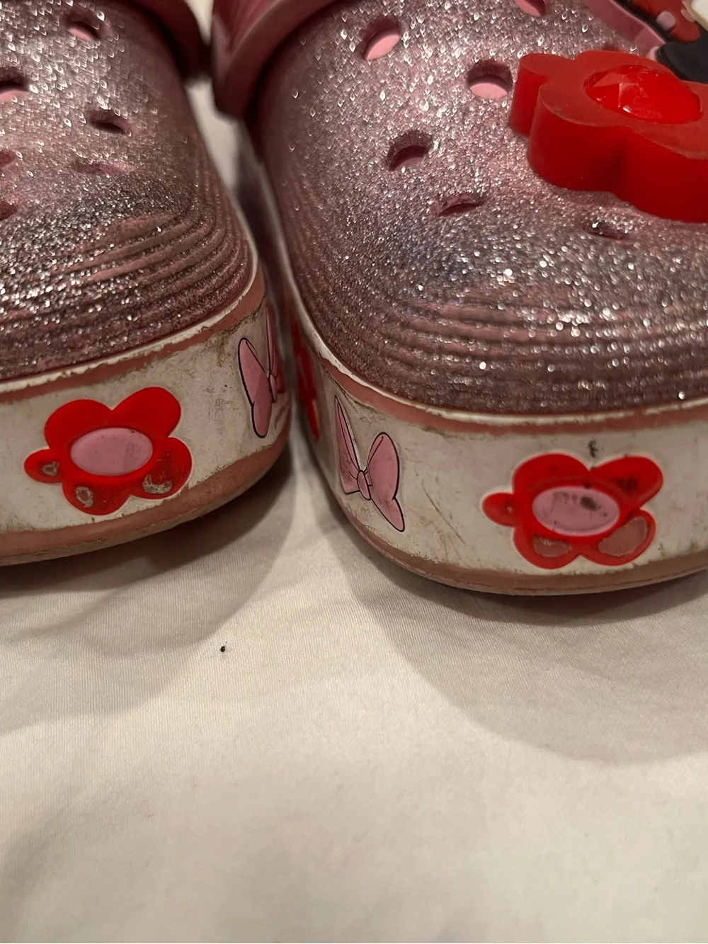 CROCS Kids' Pink Glitter Clogs with Red Flower & Minnie Charms